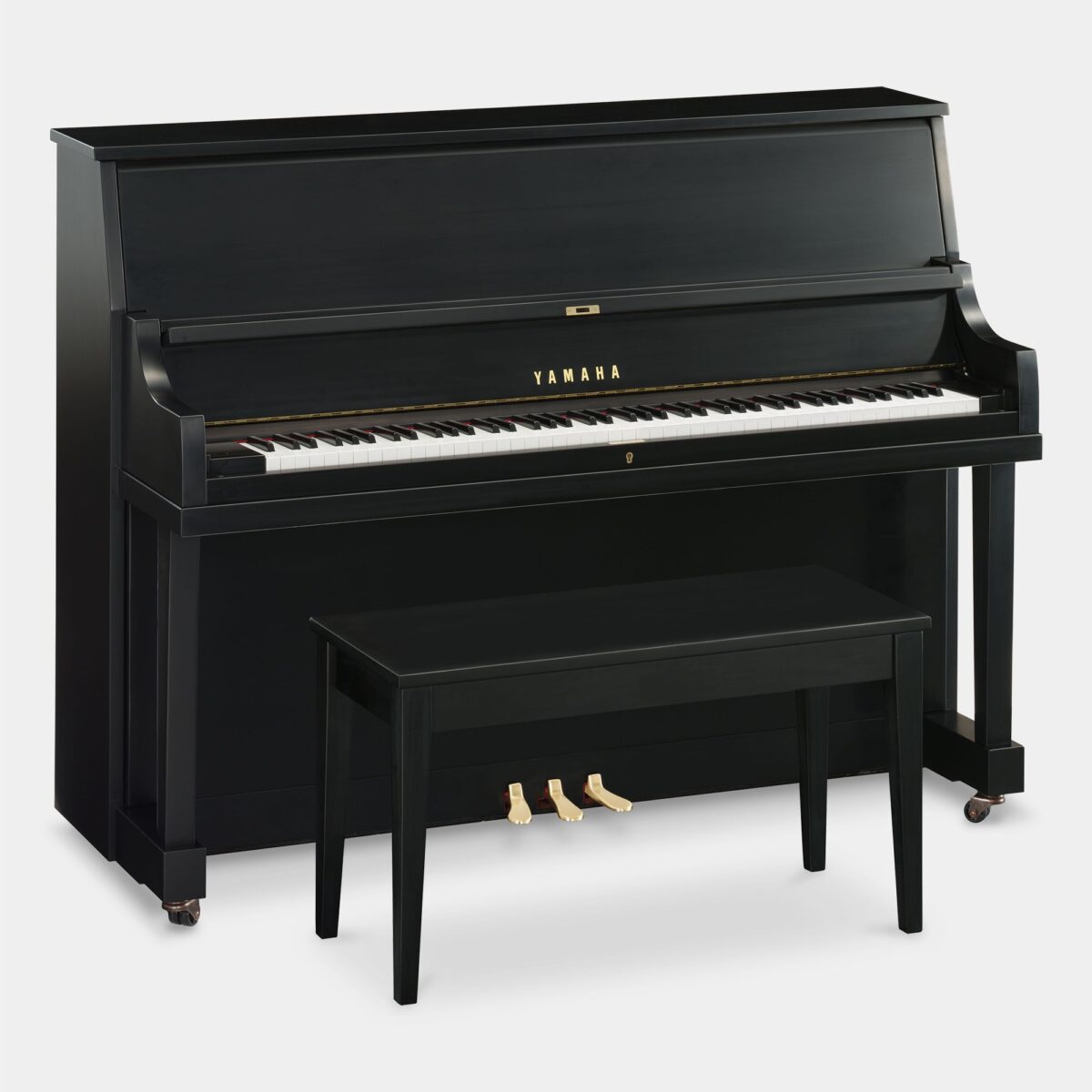 Yamaha upright piano with matching bench, black finish, ideal for home or studio use. Available at Classic Pianos Portland.