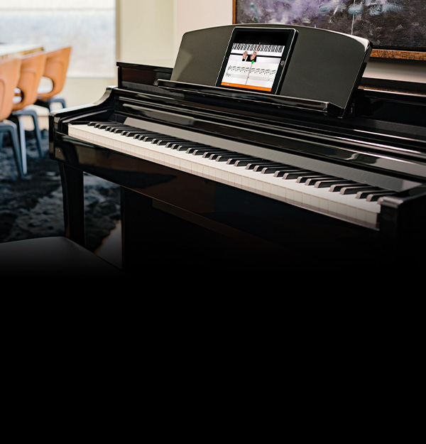Digital piano with sleek black finish, featuring touchscreen interface for advanced music control at Classic Pianos Portland.
