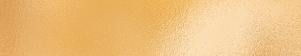 Golden textured surface, reminiscent of piano finishes. Highlights Classic Pianos' commitment to exquisite craftsmanship.